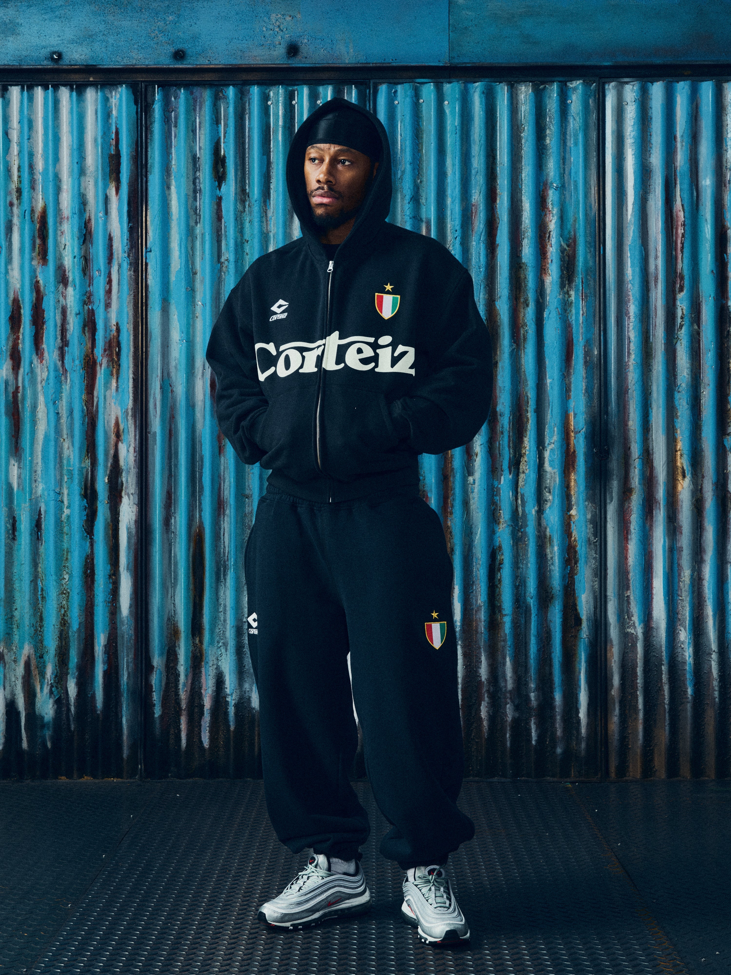 GHINI ZIP HOODIE [BLACK]